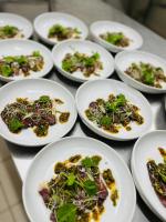 un grupo de platos de comida sobre una mesa en Hôtel de la Brière et Restaurant Les Krapados, en Saint-Lyphard