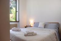 Posteľ alebo postele v izbe v ubytovaní Villa Olga Lago Maggiore