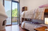 Posteľ alebo postele v izbe v ubytovaní Villa Olga Lago Maggiore