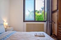 Posteľ alebo postele v izbe v ubytovaní Villa Olga Lago Maggiore