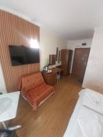 A bed or beds in a room at Guest House Skalite
