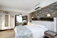 Postel nebo postele na pokoji v ubytování Dedeminn Marina Hotel