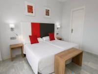 A bed or beds in a room at Pleasant apartment in Benalmadena near Playa Beach