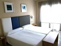 A bed or beds in a room at Pleasant apartment in Benalmadena near Playa Beach