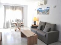 A seating area at Pleasant apartment in Benalmadena near Playa Beach