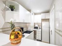 A kitchen or kitchenette at Pleasant apartment in Benalmadena near Playa Beach