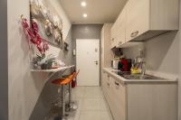 A kitchen or kitchenette at Affittacamere Orchidea for Tourists Hesperia Hosp