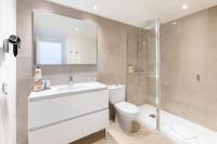 a bathroom with a toilet and a sink and a shower at Sol Fuerteventura Jandia - All Suites in Morro del Jable