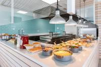 a buffet line with many different types of food at Sol Fuerteventura Jandia - All Suites in Morro del Jable