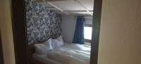 Posteľ alebo postele v izbe v ubytovaní Bed & Breakfast Der Tiroler