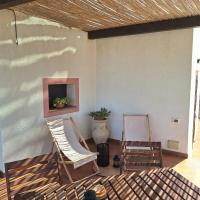 A seating area at Dammuso Surya Cloe