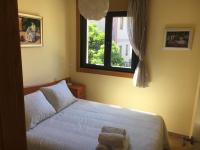 A bed or beds in a room at Beautiful house in Cangas near the beach