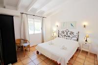 A bed or beds in a room at Marcelo - charming, Finca style holiday villa in Moraira