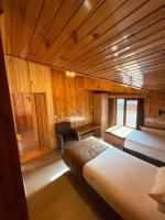 A bed or beds in a room at Ozkan Otel