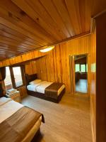 A bed or beds in a room at Ozkan Otel