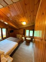 A bed or beds in a room at Ozkan Otel
