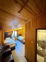 A bed or beds in a room at Ozkan Otel