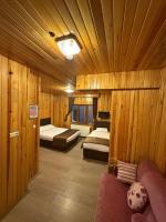 A bed or beds in a room at Ozkan Otel