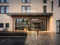 a building with the entrance to a keep depot at Zleep Hotel Frankfurt Airport Kelsterbach in Kelsterbach