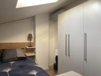 Łóżko lub łóżka w pokoju w obiekcie Le petit Atelier