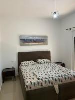 Ein Bett oder Betten in einem Zimmer der Unterkunft Montebello Inn apartments