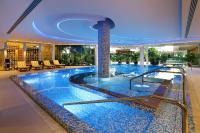 a large swimming pool in a hotel at Four Seasons Hotel in Limassol