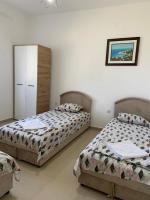 Ein Bett oder Betten in einem Zimmer der Unterkunft Montebello Inn apartments