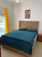 Ein Bett oder Betten in einem Zimmer der Unterkunft Montebello Inn apartments