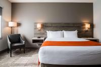 Amsterdam Inn & Suites, Ascend Hotel Collectionにあるベッド