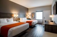 Amsterdam Inn & Suites, Ascend Hotel Collectionにあるベッド