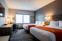Amsterdam Inn & Suites, Ascend Hotel Collectionにあるベッド