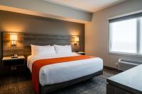 Amsterdam Inn & Suites, Ascend Hotel Collectionにあるベッド