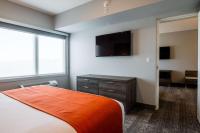 Amsterdam Inn & Suites, Ascend Hotel Collectionにあるベッド