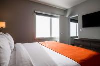 Amsterdam Inn & Suites, Ascend Hotel Collectionにあるベッド