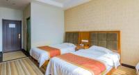 169 Business Hotelにあるベッド