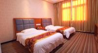 169 Business Hotelにあるベッド