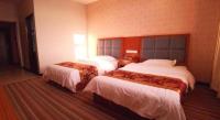 169 Business Hotelにあるベッド