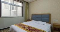 169 Business Hotelにあるベッド