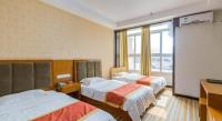 169 Business Hotelにあるベッド