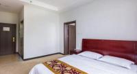 169 Business Hotelにあるベッド