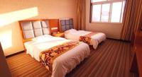 169 Business Hotelにあるベッド