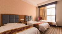 169 Business Hotelにあるベッド