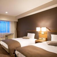 Imazu Sun Bridge Hotelにあるベッド