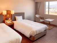 Imazu Sun Bridge Hotelにあるベッド