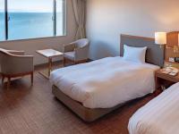Imazu Sun Bridge Hotelにあるベッド
