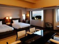 Imazu Sun Bridge Hotelにあるベッド