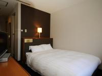Imazu Sun Bridge Hotelにあるベッド