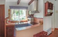 Kuchnia lub aneks kuchenny w obiekcie Welcoming chalet with lake and mountain view - El Gastor