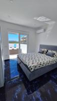 Ein Bett oder Betten in einem Zimmer der Unterkunft Montebello Inn apartments