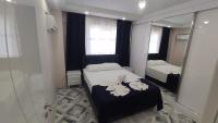 Postel nebo postele na pokoji v ubytování Engin HOME